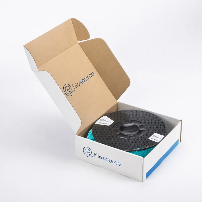 Open printed retail box showing the labelled spool inside