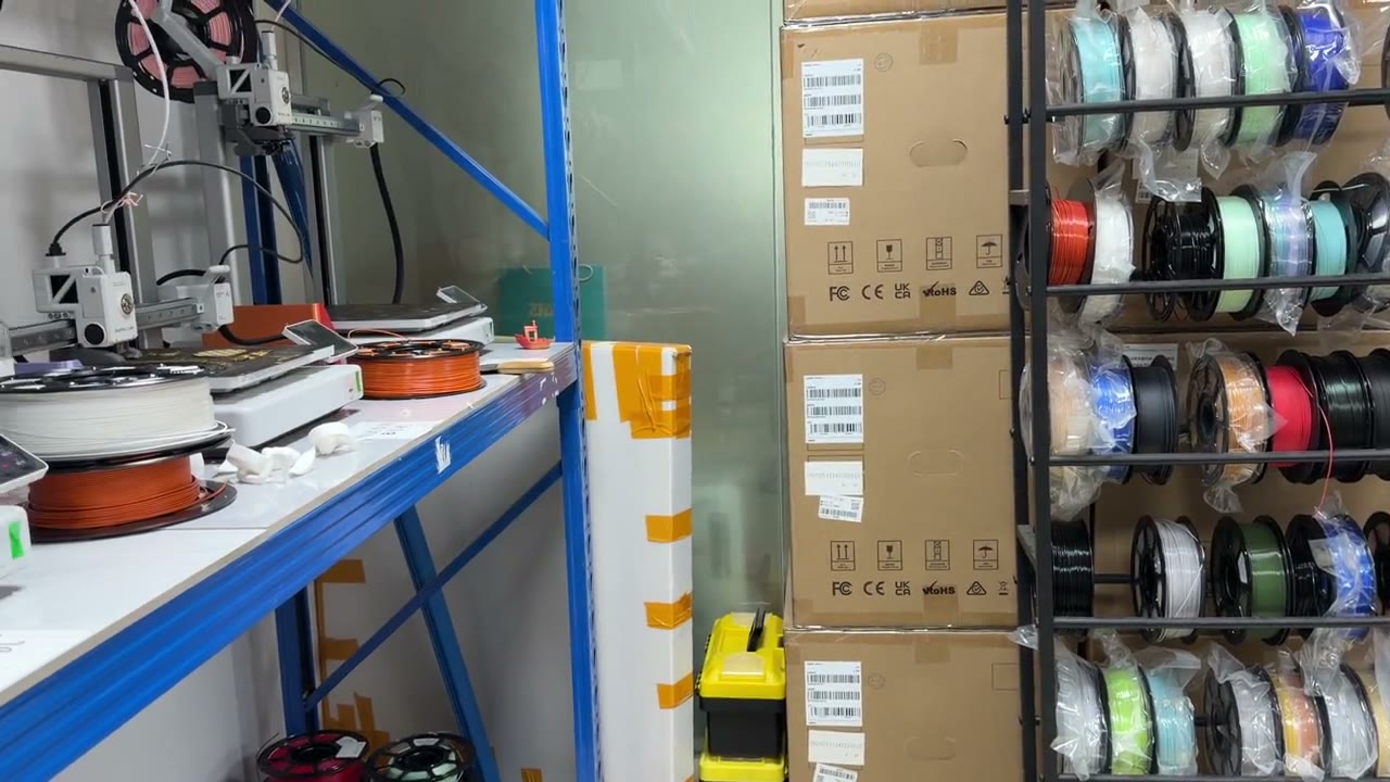 Sealed filament spools staged in finished goods warehouse